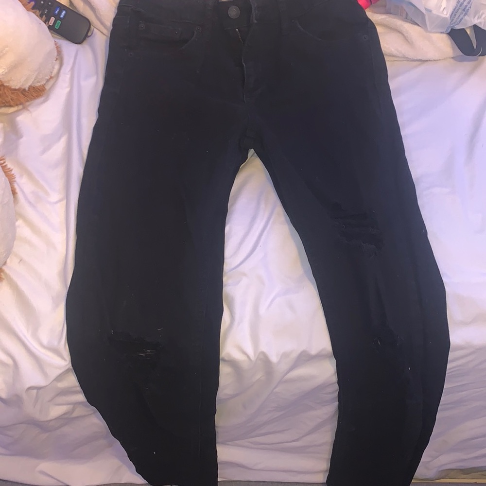 Black ripped jeans